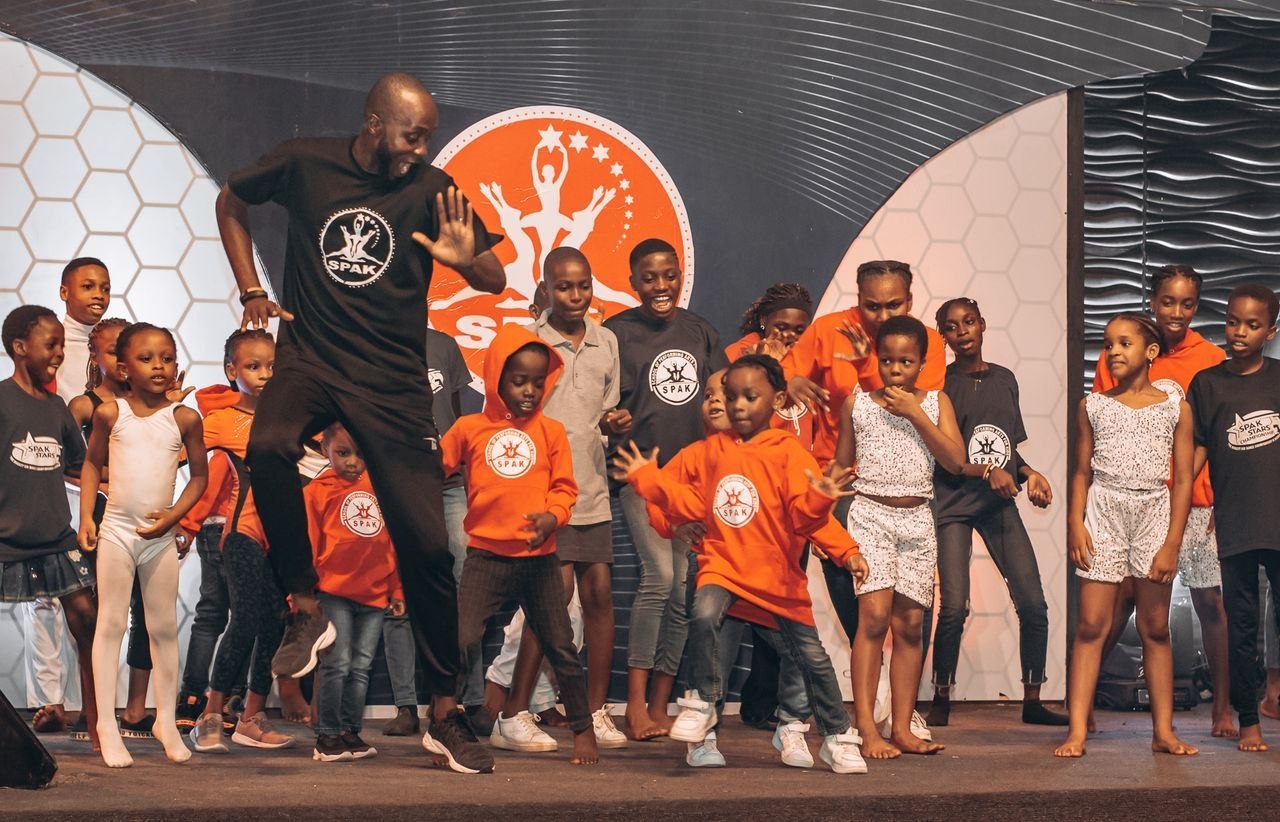 Young performers preparing for a showcase